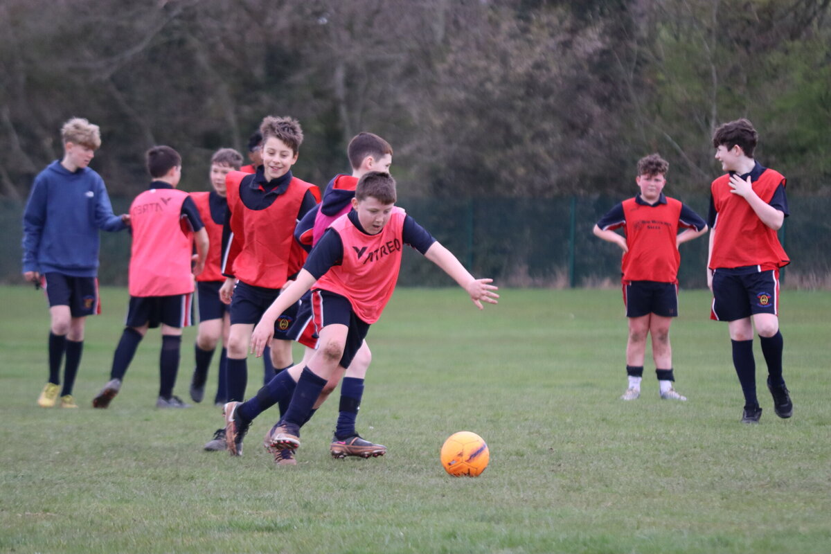 Image of Pupils in year 7 enjoy competing in football and netball during Interform