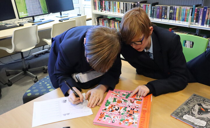 Image of Year 7 pupils enjoy discovering and reading books in French, Italian, Polish, Portuguese, and Spanish